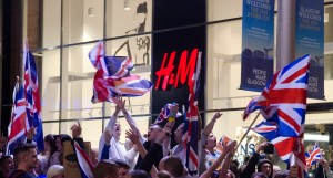 Unionists march in celebration the night following the referendum.